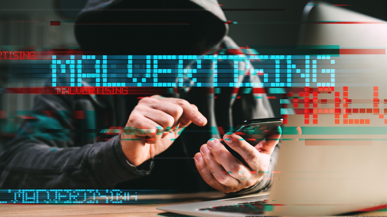The word MALTERTISING made out of blue dots, superimposed over photo of a hooded figure