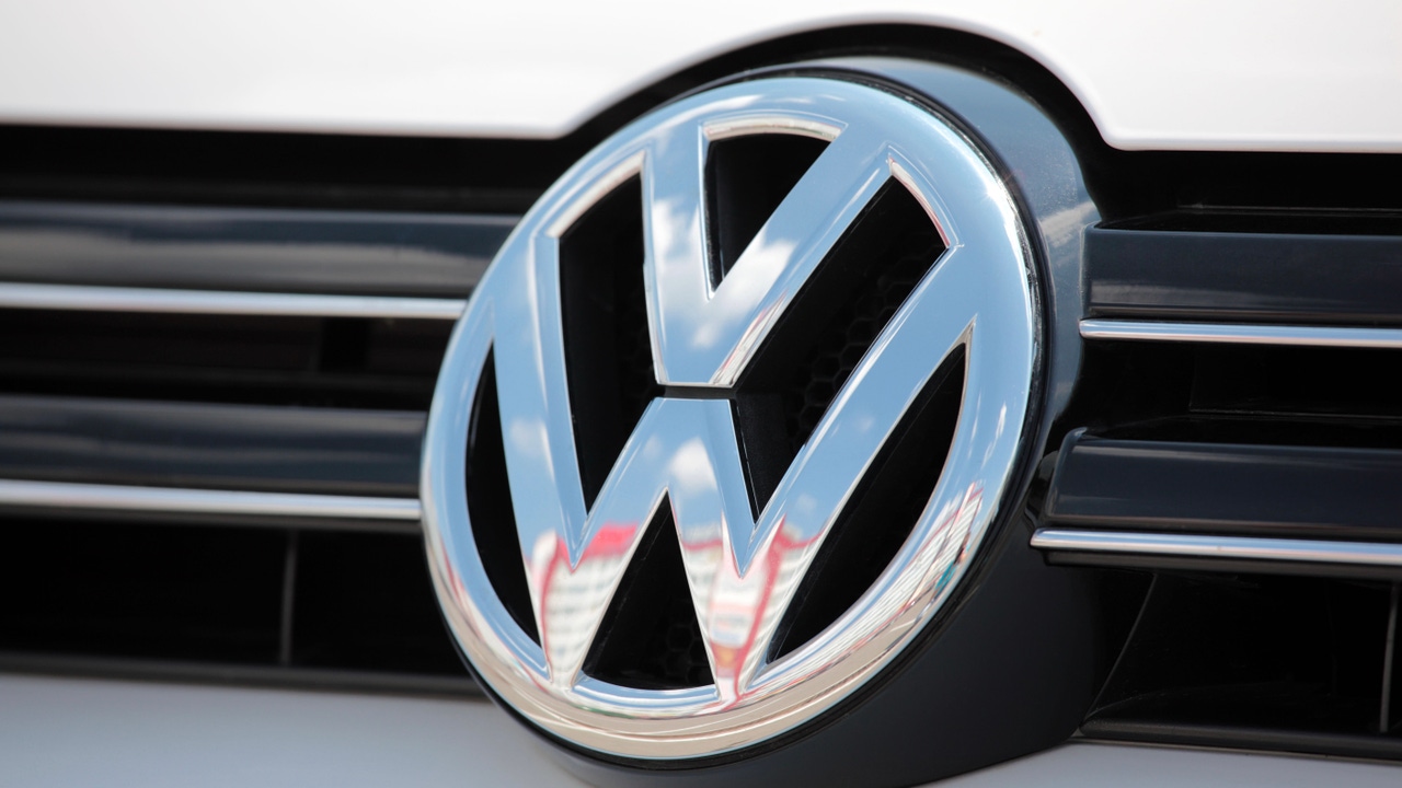 Close-up of the Volkswagen emblem on a Golf 6 (Mk VI) car Close-up of the Volkswagen emblem on a Golf 6 (Mk VI) car