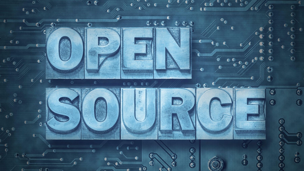 a sign with the words 'open source' written in blue