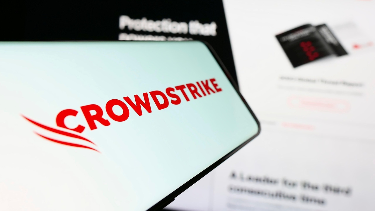 The CrowdStrike logo on a phone screen