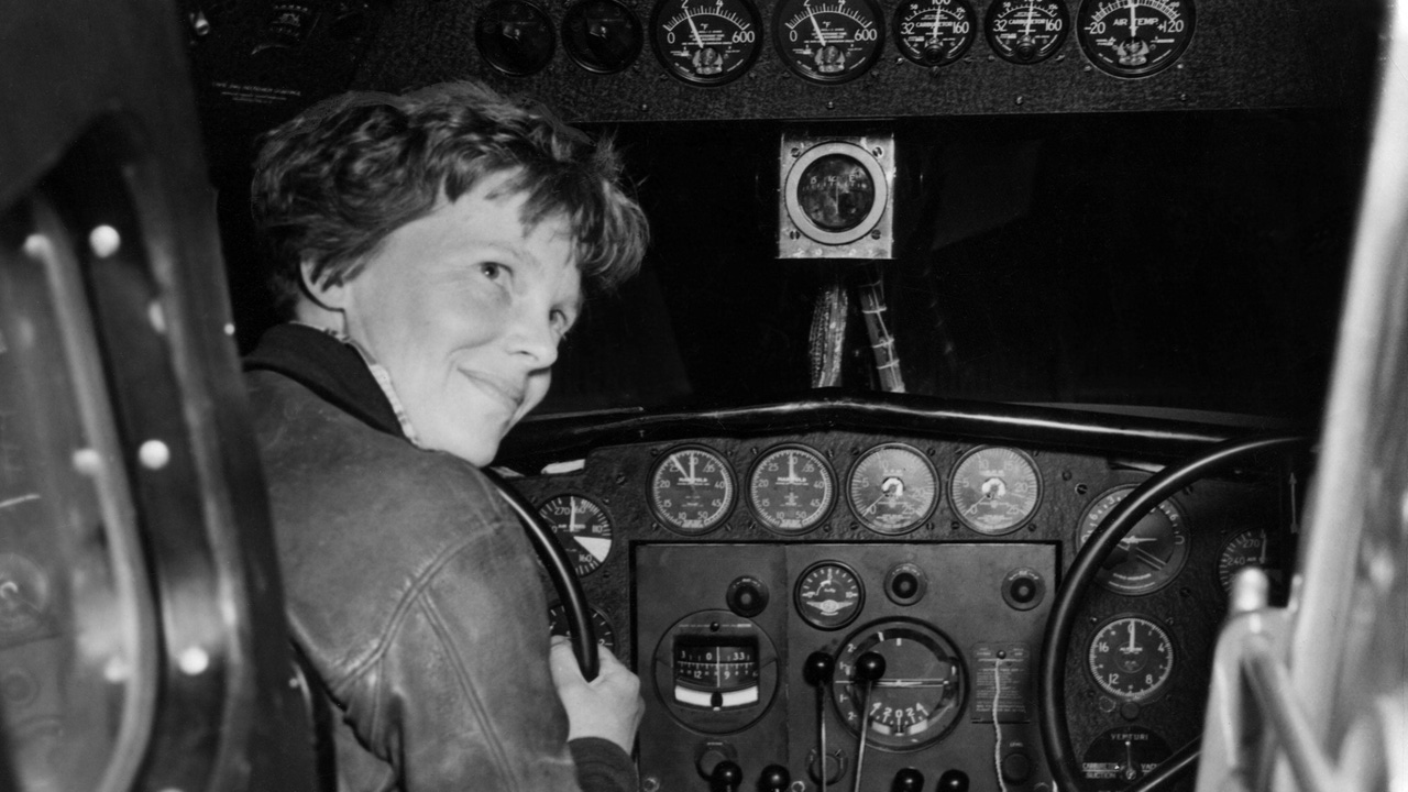 Amelia Earhart in her Lockheed L-10E Electra preparing for 27,000 mile globe flight in 1937 Amelia Earhart in her Lockheed L-10E Electra preparing for 27,000 mile globe flight in 1937