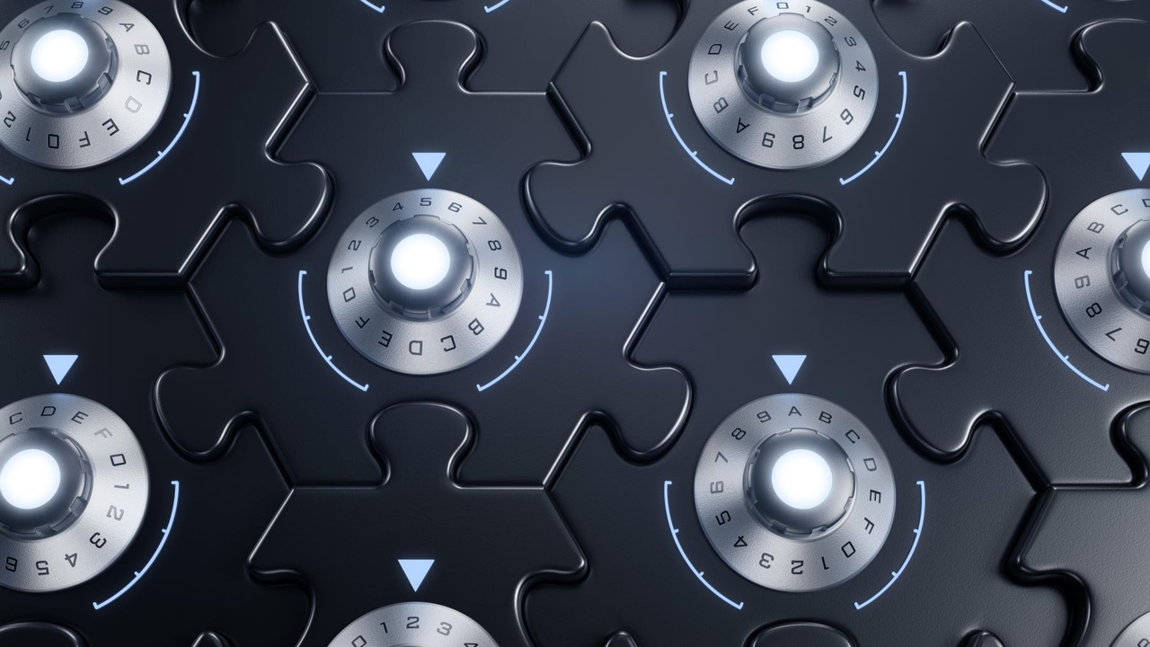 Jigsaw puzzle with black background; the pieces have combination locks on them