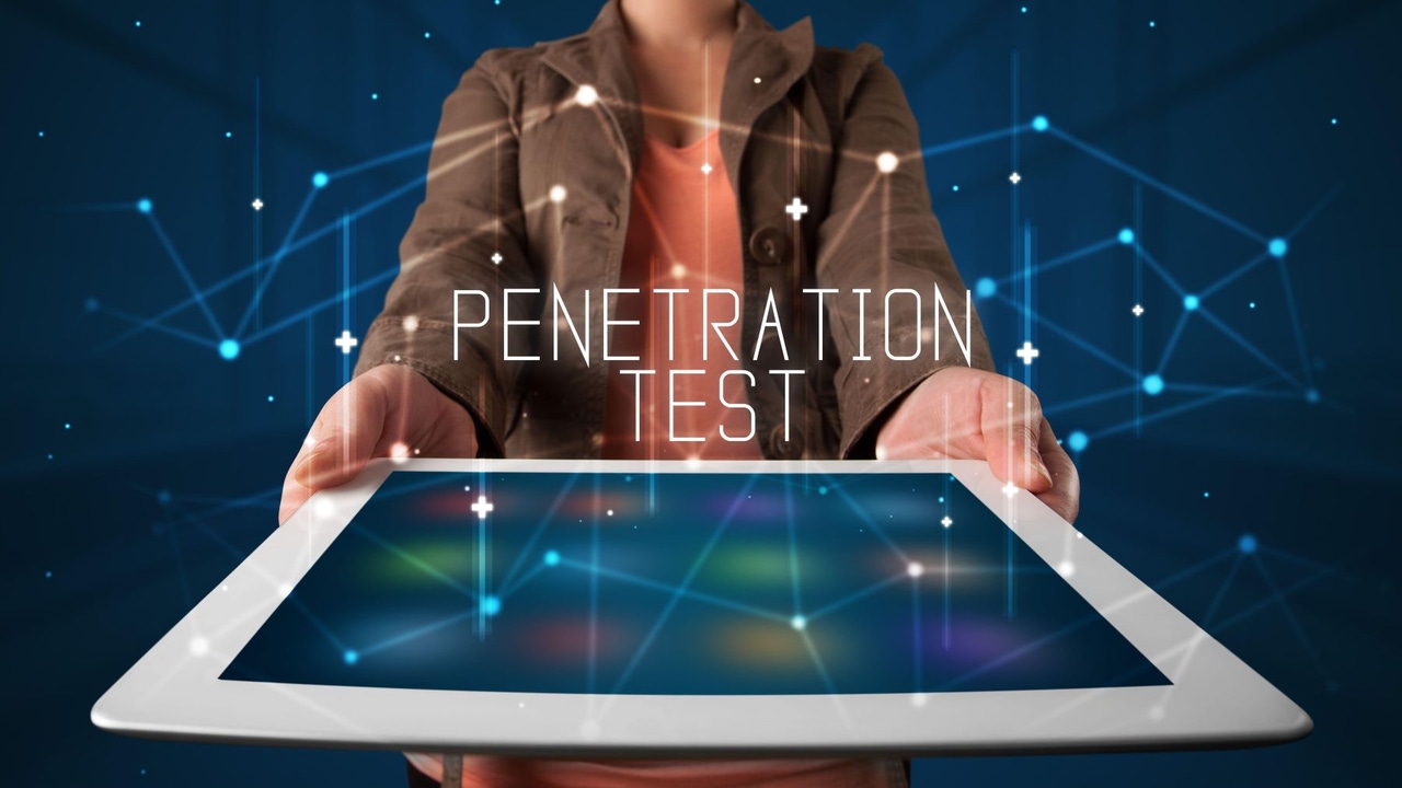 Person holing a tablet; above the tablet, the words "PENETRATION TEST" Person holing a tablet; above the tablet, the words "PENETRATION TEST"