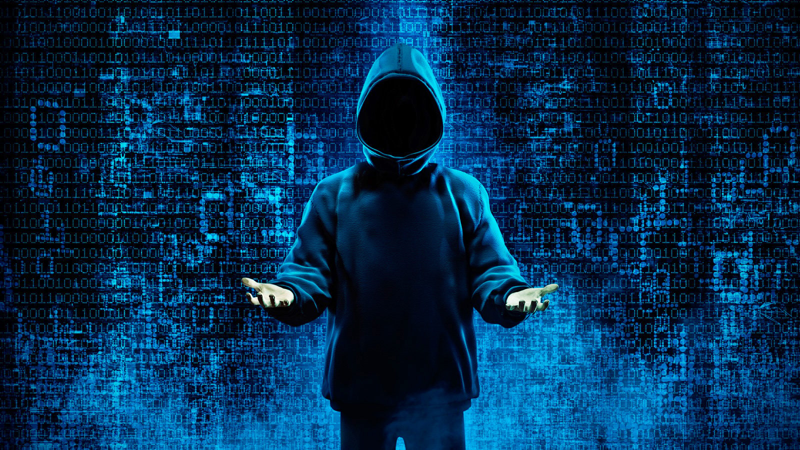 Hacker holding his arms up