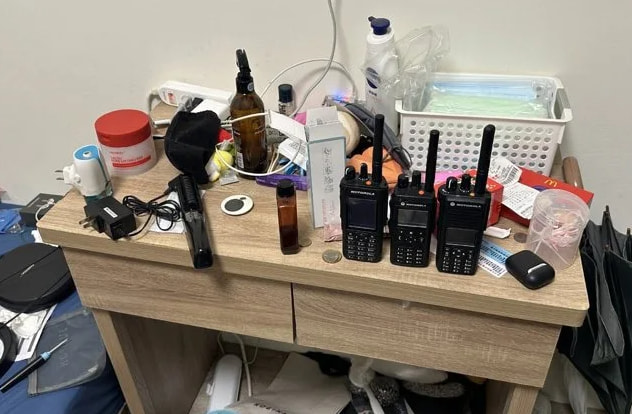Handheld radios seized on Lin's residence